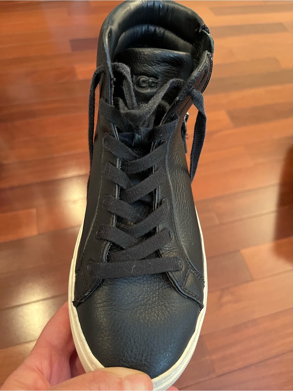 UGG Women's Black Leather High-Top Sneakers with White Sole